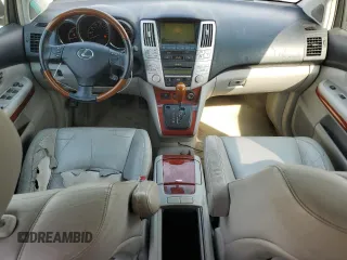 2008 Lexus RX 400h with VIN JTJGW31U582851546, listed as a Copart auction lot 52691335 with 152,790 mi miles and Salvage Title. Bid and sale history available at DreamBid. Image 8.