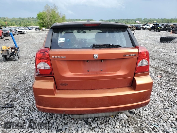 2010 Dodge Caliber Mainstreet z VIN 1B3CB3HA1AD568937, wystawiony jako Copart lot #55159255 z przebiegiem 128 014 mil mil oraz Szkody całkowita. Historia ofert i sprzedaży dostępna na DreamBid. Obrazek 6.