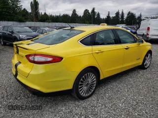 2013 Ford Fusion Titanium Hybrid with VIN 3FA6P0RU7DR326224, listed as a Copart auction lot 61597825 with 256,880 mi miles and Salvage title. Bid and sale history available at DreamBid. Image 3.