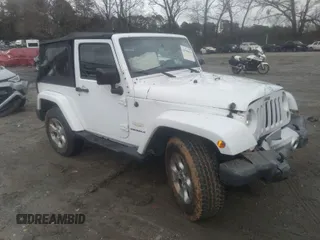 2015 Jeep Wrangler Sahara z VIN 1C4AJWBG5FL591836, wystawiony jako IAAI lot #41584836 z przebiegiem 168 734 mil mil oraz . Historia ofert i sprzedaży dostępna na DreamBid. Obrazek 1.