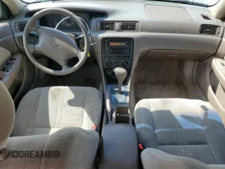 2001 Toyota Camry CE z VIN 4T1BG22K11U848960, wystawiony jako Copart lot #57259655 z przebiegiem 219 477 mil mil oraz Szkoda całkowita • Salvage title. Historia ofert i sprzedaży dostępna na DreamBid. Obrazek 8.