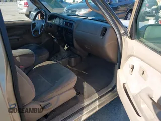 2002 Toyota Tacoma z VIN 5TEVL52NX2Z143074, wystawiony jako IAAI lot #42379132 z przebiegiem 288 039 mil mil oraz . Historia ofert i sprzedaży dostępna na DreamBid. Obrazek 5.