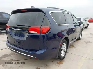 2017 Chrysler Pacifica Touring L with VIN 2C4RC1BG2HR526422, listed as a IAAI auction lot 42032839 with 180,710 mi miles and . Bid and sale history available at DreamBid. Image 4.