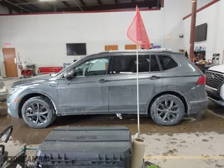 2023 Volkswagen Tiguan SE with VIN 3VVMB7AX5PM013447, listed as a IAAI auction lot 41615200 with 66,259 mi miles. Bid and sale history available at carsss.com. Image 14.