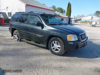 2005 GMC Envoy SLE with VIN 1GKDT13S852116252, listed as a IAAI auction lot 42086929 with 1 mi miles. Bid and sale history available at carsss.com. Image 1.