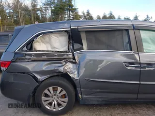 2014 Honda Odyssey EX-L with VIN 5FNRL5H67EB073640, listed as a IAAI auction lot 41115124 with 99,841 mi miles and . Bid and sale history available at carsss.com. Image 19.