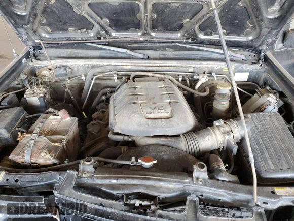 2001 Isuzu Rodeo S with VIN 4S2CK58W614344850, listed as a Copart auction lot 63807664 with 176,203 mi miles and Salvage title. Bid and sale history available at DreamBid. Image 11.