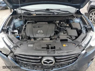 2016 Mazda CX-5 Touring with VIN JM3KE4CY4G0778032, listed as a Copart auction lot 52769065 with 81,443 mi miles and Salvage Title. Bid and sale history available at carsss.com. Image 12.
