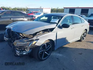 2022 Honda Accord Sport z VIN 1HGCV1F35NA117128, wystawiony jako IAAI lot #40957497 z przebiegiem 29 636 mil mil oraz . Historia ofert i sprzedaży dostępna na DreamBid. Obrazek 2.