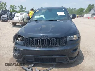 2017 Jeep Grand Cherokee Laredo with VIN 1C4RJFAGXHC818834, listed as a IAAI auction lot 42422744 with 154,287 mi miles and . Bid and sale history available at DreamBid. Image 12.