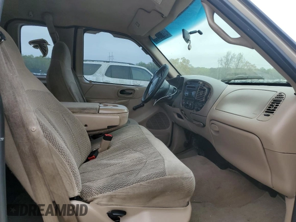 1999 Ford F-150 with VIN 1FTZX1721XNA37541, listed as a Copart auction lot 51588415 with 267,071 mi miles and Salvage title. Bid and sale history available at DreamBid. Image 10.