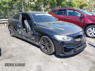 2015 BMW 4 Series 428i with VIN WBA3N7C54FK223490, listed as a IAAI auction lot 42033200 with 145,882 mi miles. Bid and sale history available at carsss.com. Image 1.