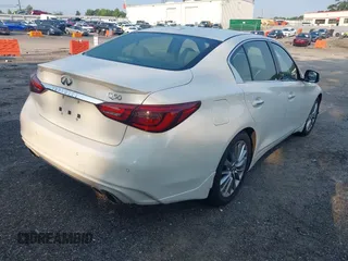 2023 Infiniti Q50 Luxe with VIN JN1EV7BP6PM512345, listed as a IAAI auction lot 42388297 with 11,204 mi miles and . Bid and sale history available at DreamBid. Image 4.