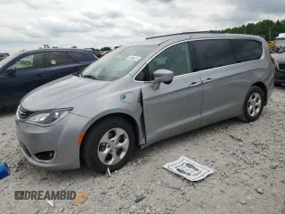 2018 Chrysler Pacifica Hybrid Touring Plus с VIN 2C4RC1H79JR158284, выставлен на аукционе Copart как лот 61360215 с пробегом 170 025 миль миль и Чистый • Clean title. История ставок и продаж доступна на DreamBid. Изображение 1.