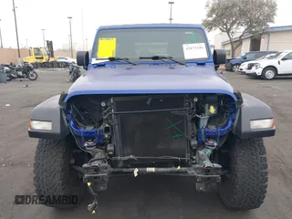 2018 Jeep Wrangler Unlimited Sport S with VIN 1C4HJXDG7JW235946, listed as a IAAI auction lot 42473146 with 37,973 mi miles and . Bid and sale history available at DreamBid. Image 13.