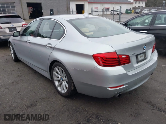 2014 BMW 5 Series 535i xDrive with VIN WBA5B3C57ED539169, listed as a IAAI auction lot 41892006 with 131,303 mi miles and . Bid and sale history available at carsss.com. Image 3.