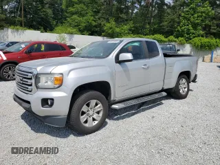 2016 GMC Canyon z VIN 1GTH5CE3XG1372815, wystawiony jako Copart lot #55076495 z przebiegiem 123 485 mil mil oraz Szkody całkowita. Historia ofert i sprzedaży dostępna na DreamBid. Obrazek 1.