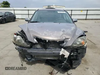 2007 Mazda 3 S Touring z VIN JM1BK344571662713, wystawiony jako Copart lot #59407825 z przebiegiem 107 723 mil mil oraz Szkoda całkowita • Salvage title. Historia ofert i sprzedaży dostępna na DreamBid. Obrazek 5.