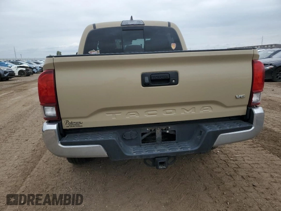 2018 Toyota Tacoma SR with VIN 3TMCZ5AN8JM145862, listed as a Copart auction lot 60190215 with 81,909 mi miles and Salvage title. Bid and sale history available at DreamBid. Image 6.