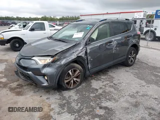 2017 Toyota RAV4 XLE with VIN JTMWFREVXHD096998, listed as a IAAI auction lot 41997925 with 119,564 mi miles and . Bid and sale history available at DreamBid. Image 17.