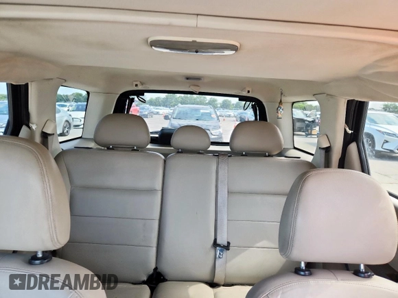 2008 Ford Escape XLT with VIN 1FMCU03128KA81939, listed as a Copart auction lot 63922515 with 182,089 mi miles and Salvage title. Bid and sale history available at DreamBid. Image 10.