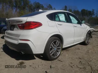 2018 BMW X4 M40i with VIN 5UXXW7C51J0W64529, listed as a Copart auction lot 44030463 with 76,768 mi miles. Bid and sale history available at carsss.com. Image 3.