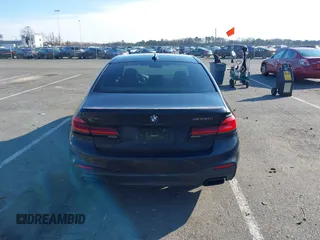 2018 BMW 5 Series M550i xDrive with VIN WBAJB9C55JB049529, listed as a IAAI auction lot 41241917 with 116,265 mi miles and . Bid and sale history available at carsss.com. Image 16.