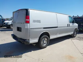 2017 Chevrolet Express Cargo Van with VIN 1GCWGBFFXH1139037, listed as a IAAI auction lot 41784999 with 198,660 mi miles. Bid and sale history available at carsss.com. Image 4.