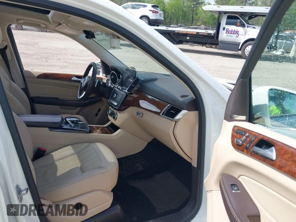 2019 Mercedes-Benz GLS with VIN 4JGDF6EE0KB232821, listed as a IAAI auction lot 42095895 with 62,532 mi miles. Bid and sale history available at carsss.com. Image 5.