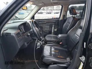 2008 Jeep Patriot Limited with VIN 1J8FT48W48D784052, listed as a Copart auction lot 84466004 with 124,667 mi miles and Salvage Title. Bid and sale history available at DreamBid. Image 7.