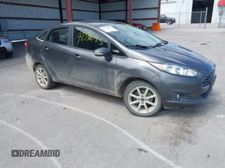 2017 Ford Fiesta SE z VIN 3FADP4BJ2HM134825, wystawiony jako IAAI lot #42331095 z przebiegiem 117 794 mil mil oraz . Historia ofert i sprzedaży dostępna na DreamBid. Obrazek 1.