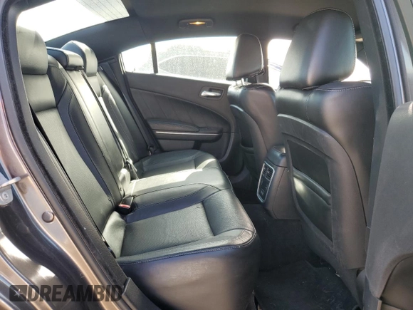 2018 Dodge Charger GT with VIN 2C3CDXJG2JH198605, listed as a Copart auction lot 49084635 with 128,646 mi miles and Salvage Title. Bid and sale history available at DreamBid. Image 10.