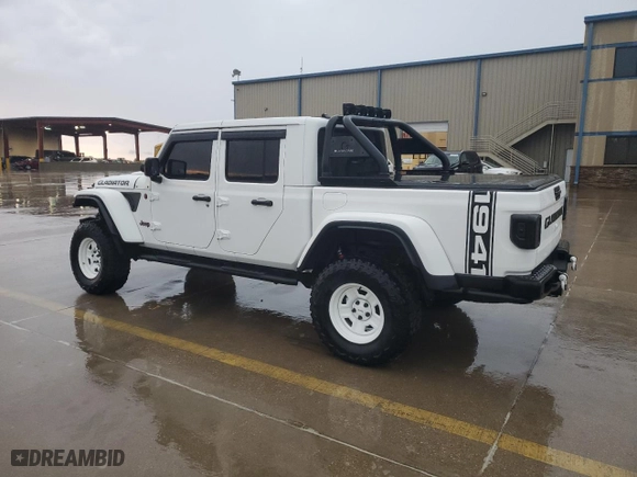 2022 Jeep Gladiator Rubicon with VIN 1C6JJTBG5NL152818, listed as a Copart auction lot 57170834 with 9,579 mi miles and Salvage Title. Bid and sale history available at carsss.com. Image 2.