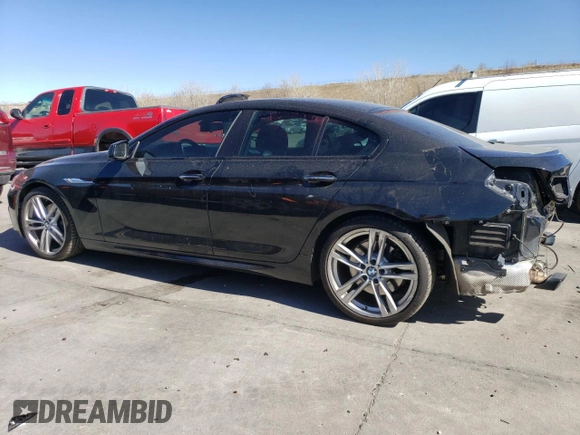 2015 BMW 6 Series 650i xDrive with VIN WBA6B4C55FD761124, listed as a Copart auction lot 50559555 with 49,735 mi miles and Salvage Title. Bid and sale history available at DreamBid. Image 2.