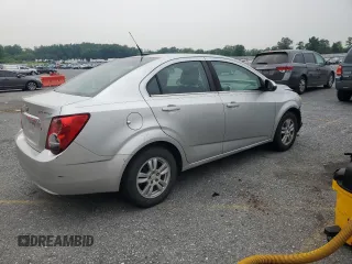 2014 Chevrolet Sonic LT z VIN 1G1JC5SH1E4243983, wystawiony jako Copart lot #59483085 z przebiegiem 106 345 mil mil oraz Szkoda całkowita • Salvage title. Historia ofert i sprzedaży dostępna na DreamBid. Obrazek 3.