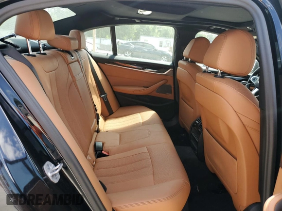 2023 BMW 5 Series 530i with VIN WBA53BH04PWY02486, listed as a Copart auction lot 54519385 with 26,979 mi miles and Salvage title. Bid and sale history available at DreamBid. Image 10.