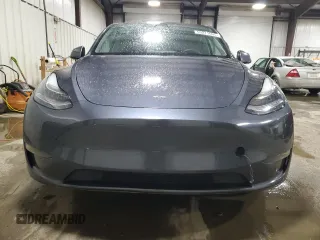 2022 Tesla Model Y Long Range with VIN 7SAYGDEE7NF422837, listed as a Copart auction lot 55271665 with 52,976 mi miles and Clean Title. Bid and sale history available at DreamBid. Image 5.