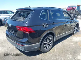 2020 Volkswagen Tiguan SE with VIN 3VV3B7AX1LM139519, listed as a IAAI auction lot 41890276 with 147,303 mi miles and . Bid and sale history available at DreamBid. Image 4.