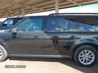 2014 Ford Flex SE z VIN 2FMGK5B83EBD43878, wystawiony jako IAAI lot #42037778 z przebiegiem 114 346 mil mil oraz . Historia ofert i sprzedaży dostępna na DreamBid. Obrazek 14.