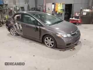 2009 Honda Civic LX z VIN 2HGFA16559H513352, wystawiony jako IAAI lot #41199384 z przebiegiem 192 750 mil mil oraz . Historia ofert i sprzedaży dostępna na DreamBid. Obrazek 1.