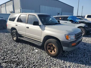 1998 Toyota 4Runner with VIN JT3GM84R3W0025871, listed as a Copart auction lot 57129535 with 219,664 mi miles and Clean title. Bid and sale history available at DreamBid. Image 4.