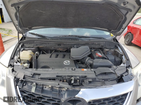 2010 Mazda CX-9 Grand Touring z VIN JM3TB3MA2A0210779, wystawiony jako Copart lot #54834665 z przebiegiem 164 358 mil mil oraz Szkoda całkowita • Salvage title. Historia ofert i sprzedaży dostępna na DreamBid. Obrazek 12.