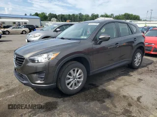 2016 Mazda CX-5 Sport with VIN JM3KE4BY9G0642481, listed as a Copart auction lot 64147255 with 79,852 mi miles and Salvage title. Bid and sale history available at DreamBid. Image 1.