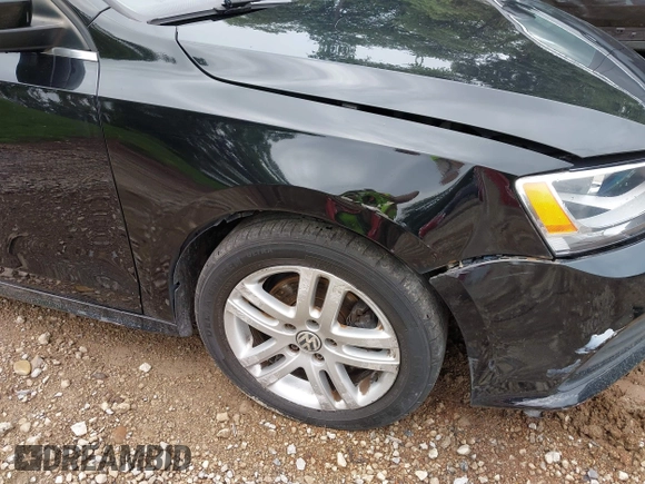 2017 Volkswagen Jetta S z VIN 3VW2B7AJ3HM303198, wystawiony jako IAAI lot #42651056 z przebiegiem 126 253 mil mil oraz . Historia ofert i sprzedaży dostępna na DreamBid. Obrazek 21.