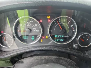 2013 Jeep Wrangler Unlimited Sport z VIN 1C4BJWDG9DL509685, wystawiony jako Copart lot #58521415 z przebiegiem 254 452 mil mil oraz Szkoda całkowita • Salvage title. Historia ofert i sprzedaży dostępna na DreamBid. Obrazek 9.