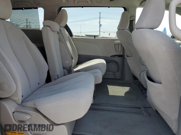 2014 Toyota Sienna LE AAS with VIN 5TDKK3DC1ES504232, listed as a Copart auction lot 54169005 with 103,724 mi miles and Salvage Title. Bid and sale history available at DreamBid. Image 11.