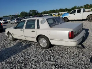 1996 Lincoln Town Car Signature with VIN 1LNLM82WXTY654457, listed as a Copart auction lot 53097635 with 257,446 mi miles and Salvage title. Bid and sale history available at DreamBid. Image 2.