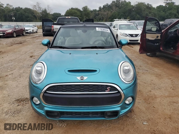 2016 MINI Convertible S z VIN WMWWG9C59G3A91280, wystawiony jako Copart lot #77838554 z przebiegiem 105 099 mil mil oraz Szkoda całkowita • Salvage title. Historia ofert i sprzedaży dostępna na DreamBid. Obrazek 5.
