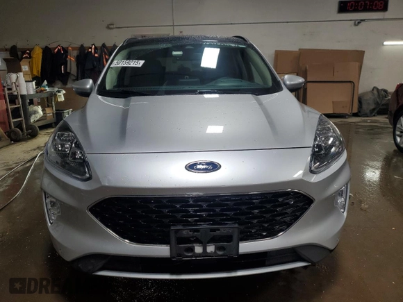 2020 Ford Escape Titanium Hybrid z VIN 1FMCU9DZ6LUB39475, wystawiony jako Copart lot #50159215 z przebiegiem 76 496 mil mil oraz Szkoda całkowita • Salvage title. Historia ofert i sprzedaży dostępna na DreamBid. Obrazek 5.