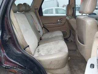 2007 Mercury Mariner Premier z VIN 4M2CU87167KJ19694, wystawiony jako IAAI lot #41496611 z przebiegiem 219 031 mil mil oraz . Historia ofert i sprzedaży dostępna na DreamBid. Obrazek 8.